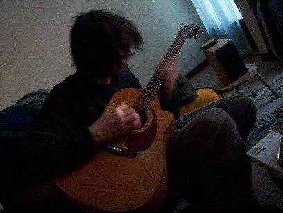 playing guitar a few years ago :)